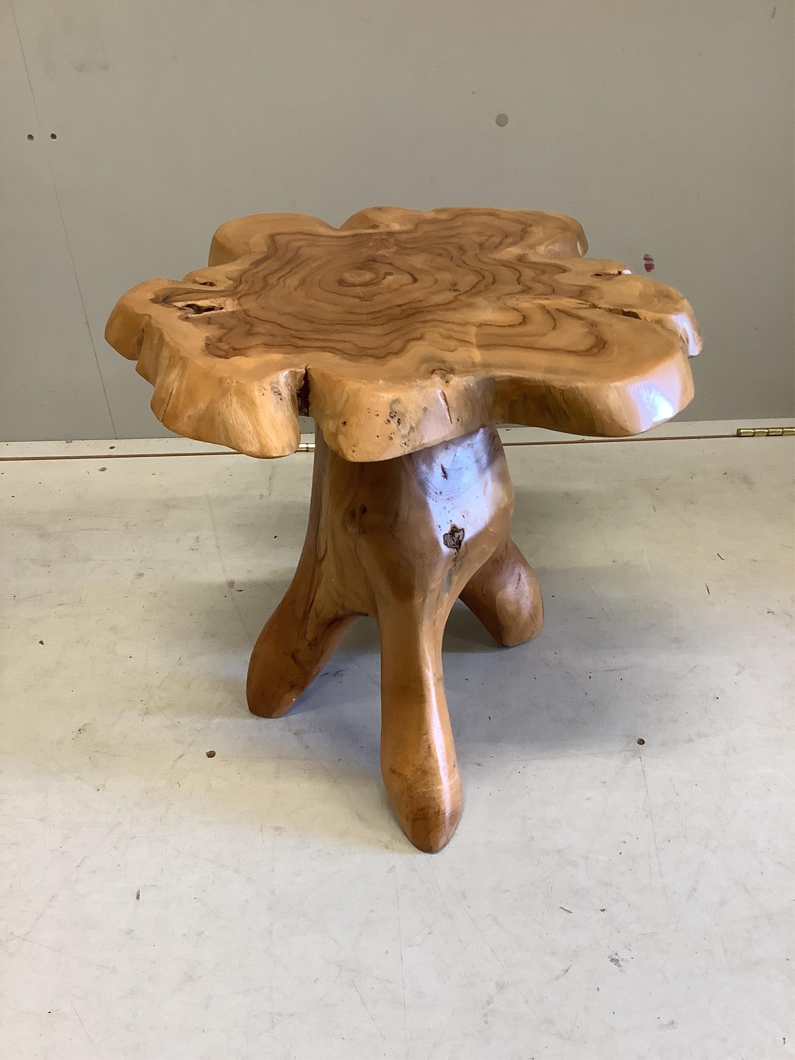 Two hand carved wood 'rustic' occasional tables, largest width 64cm, depth 64cm, height 59cm